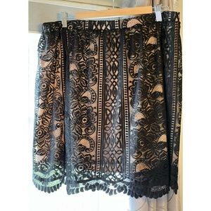 Beautiful black lace overlay skirt.
